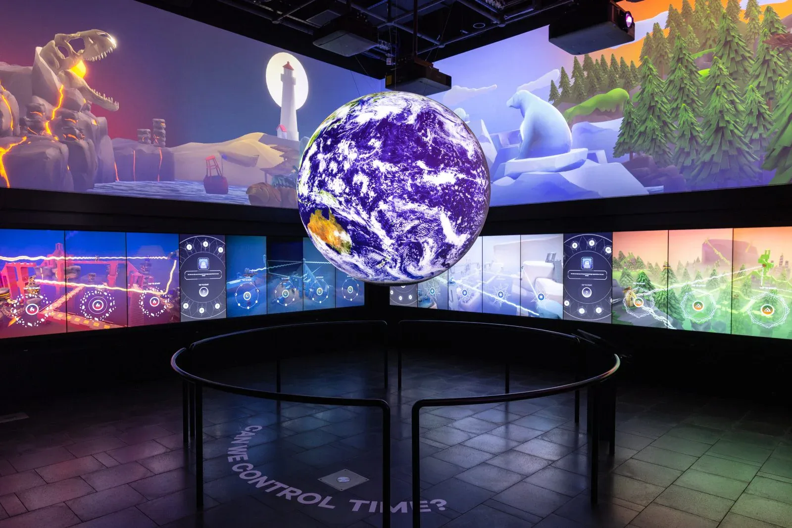 EarthTime displayed across The Cube's large screens with a central Earth globe.